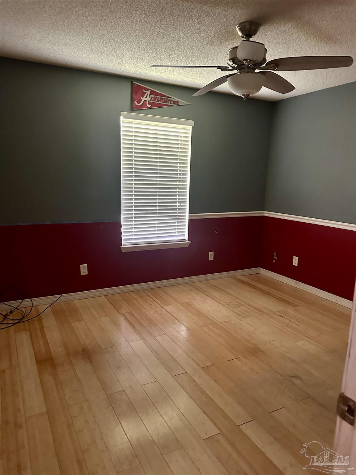 5582 Berrybrook Circle Pace, FL 32571 - Photo 11 of 15 a view of an empty room with a window