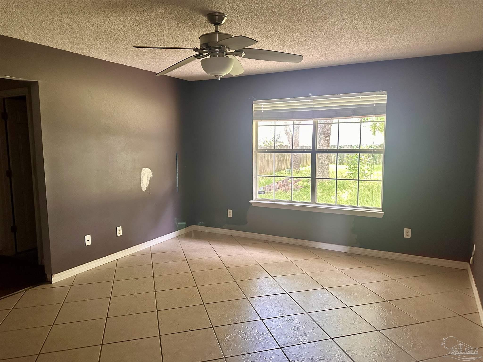 5582 Berrybrook Circle Pace, FL 32571 - Photo 9 of 15 a view of an empty room with a window
