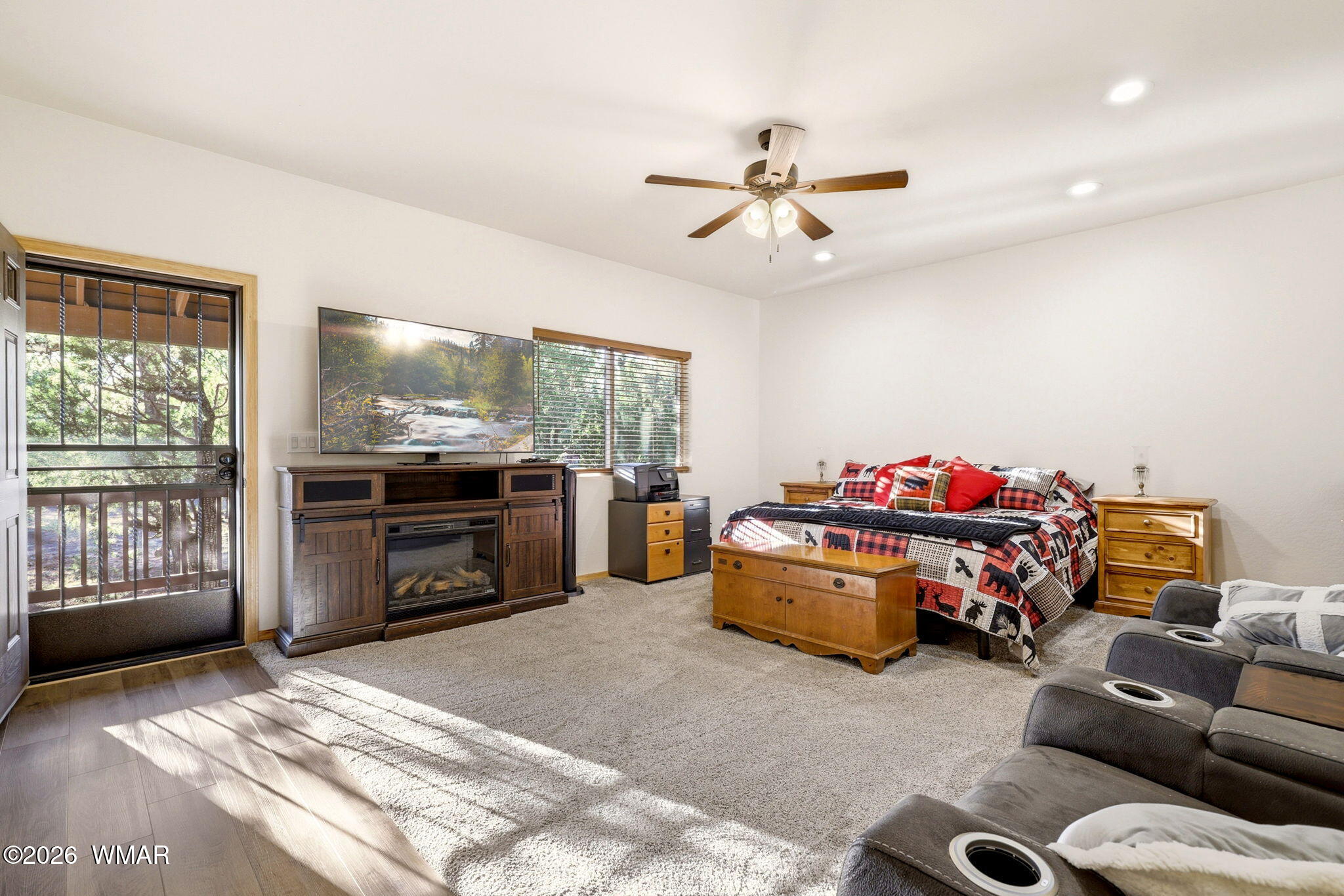 3408 Ponderosa Loop Heber, AZ 85928 - Photo 20 of 57 a bedroom with furniture and a flat screen tv