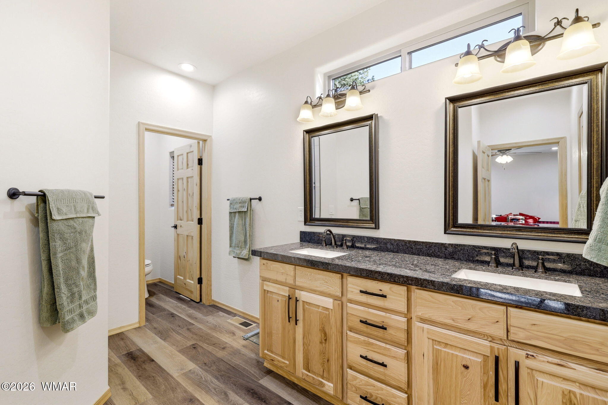 3408 Ponderosa Loop Heber, AZ 85928 - Photo 22 of 57 a bathroom with double vanity sink and a mirror