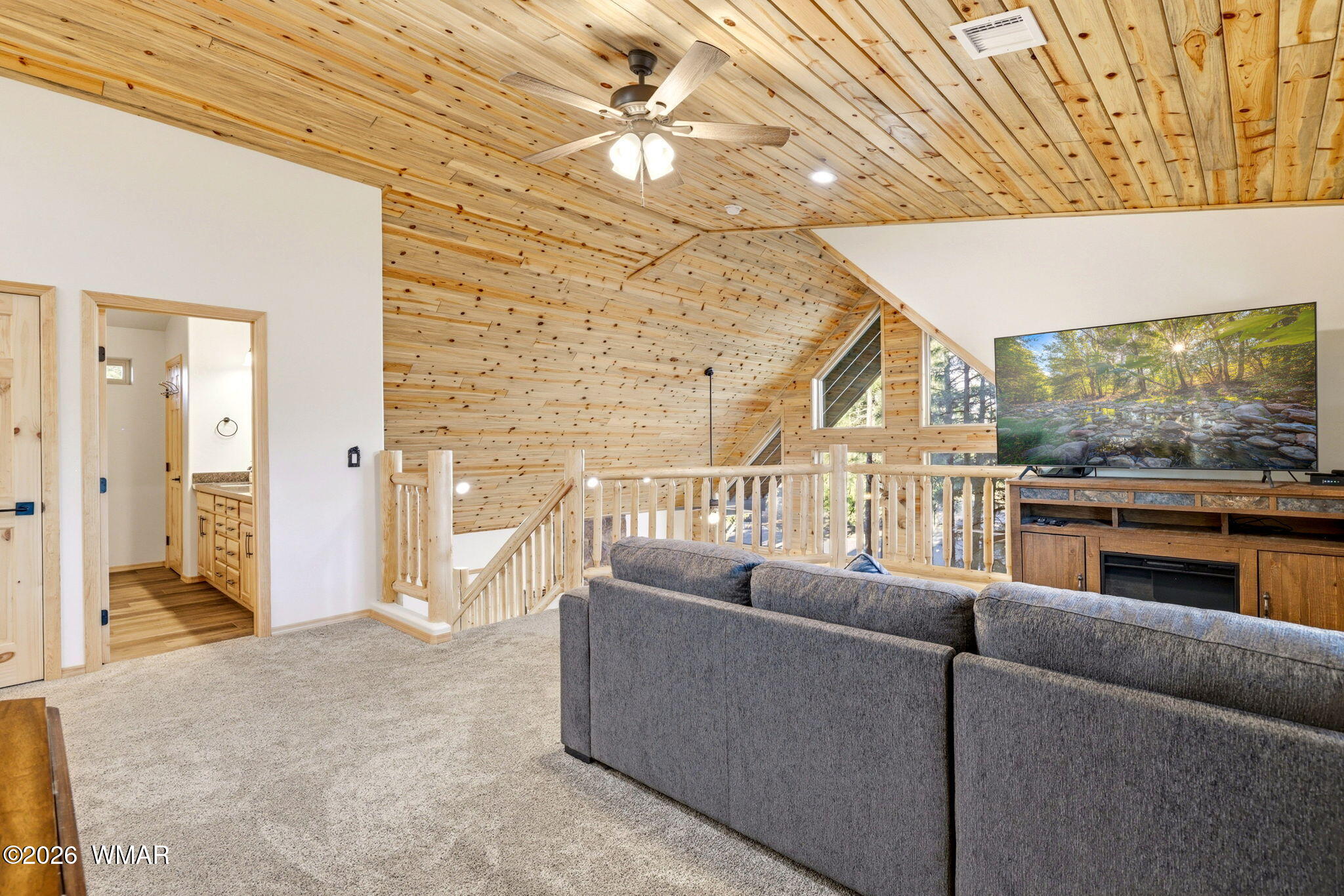 3408 Ponderosa Loop Heber, AZ 85928 - Photo 28 of 57 a living room with furniture and a floor to ceiling window