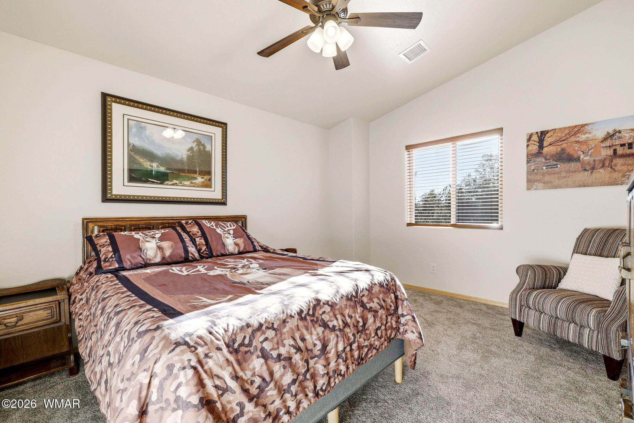 3408 Ponderosa Loop Heber, AZ 85928 - Photo 33 of 57 a bedroom with a bed and a painting on the wall