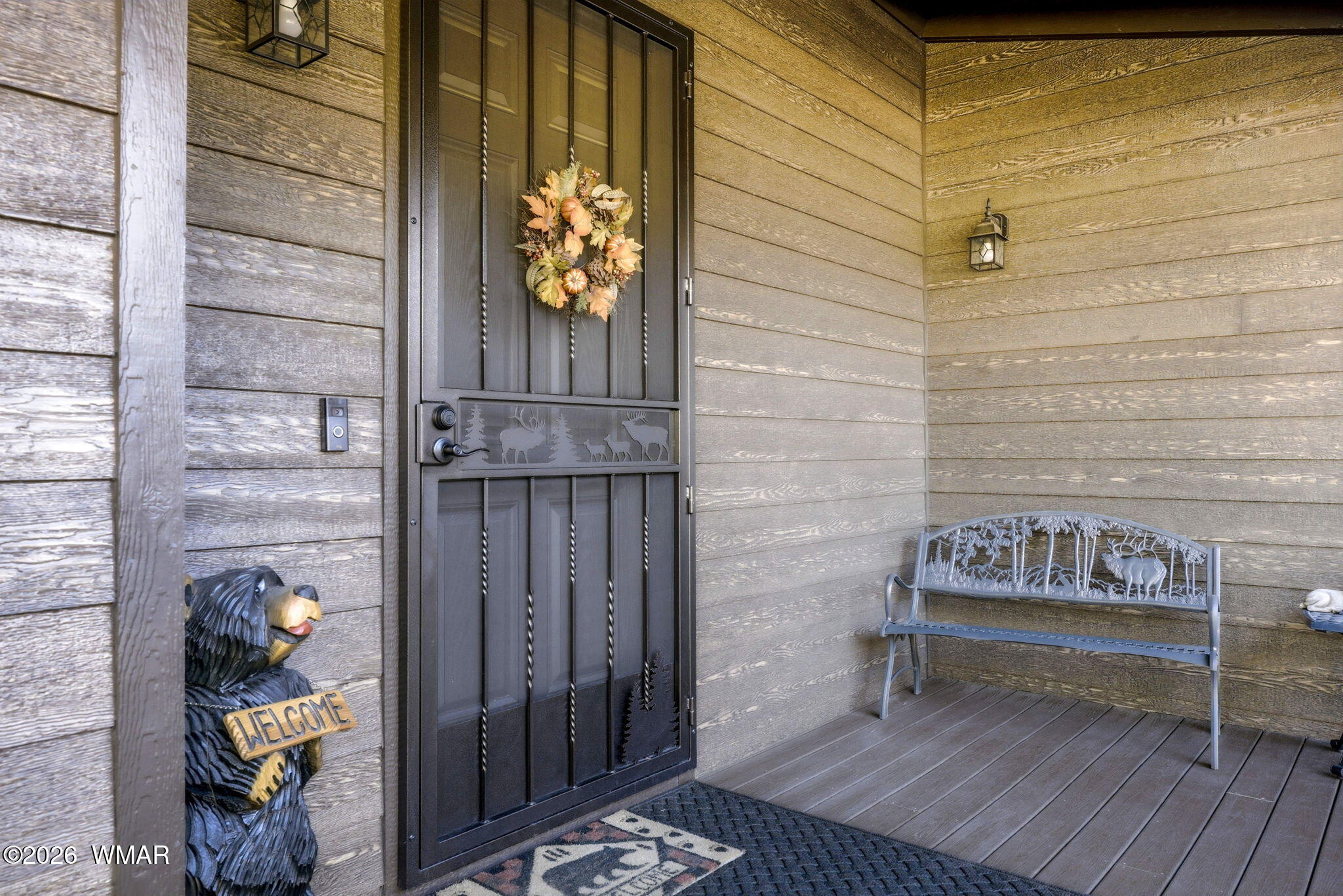 3408 Ponderosa Loop Heber, AZ 85928 - Photo 10 of 57 a bench sitting in front of a door