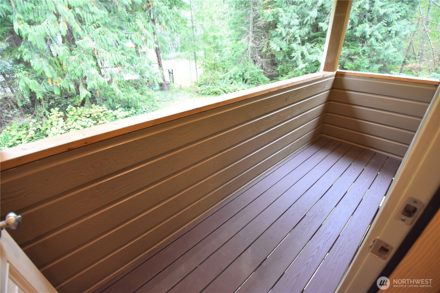 30331 Heimer Road Arlington, WA 98223 - Photo 25 of 37 a view of outdoor space with deck and trees