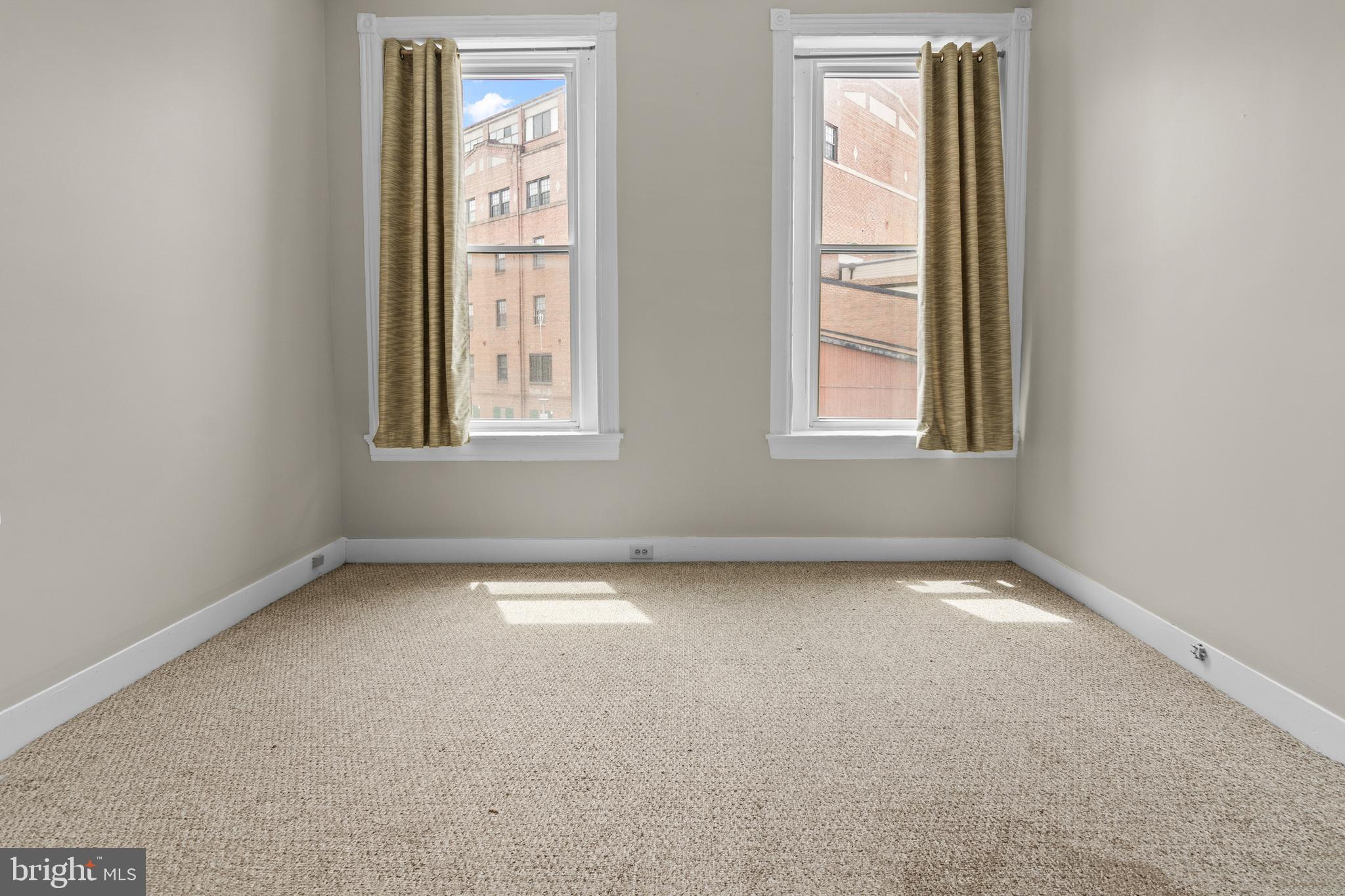 2112 Fleet Street Baltimore, MD 21231 - Photo 43 of 62 an empty room with a window