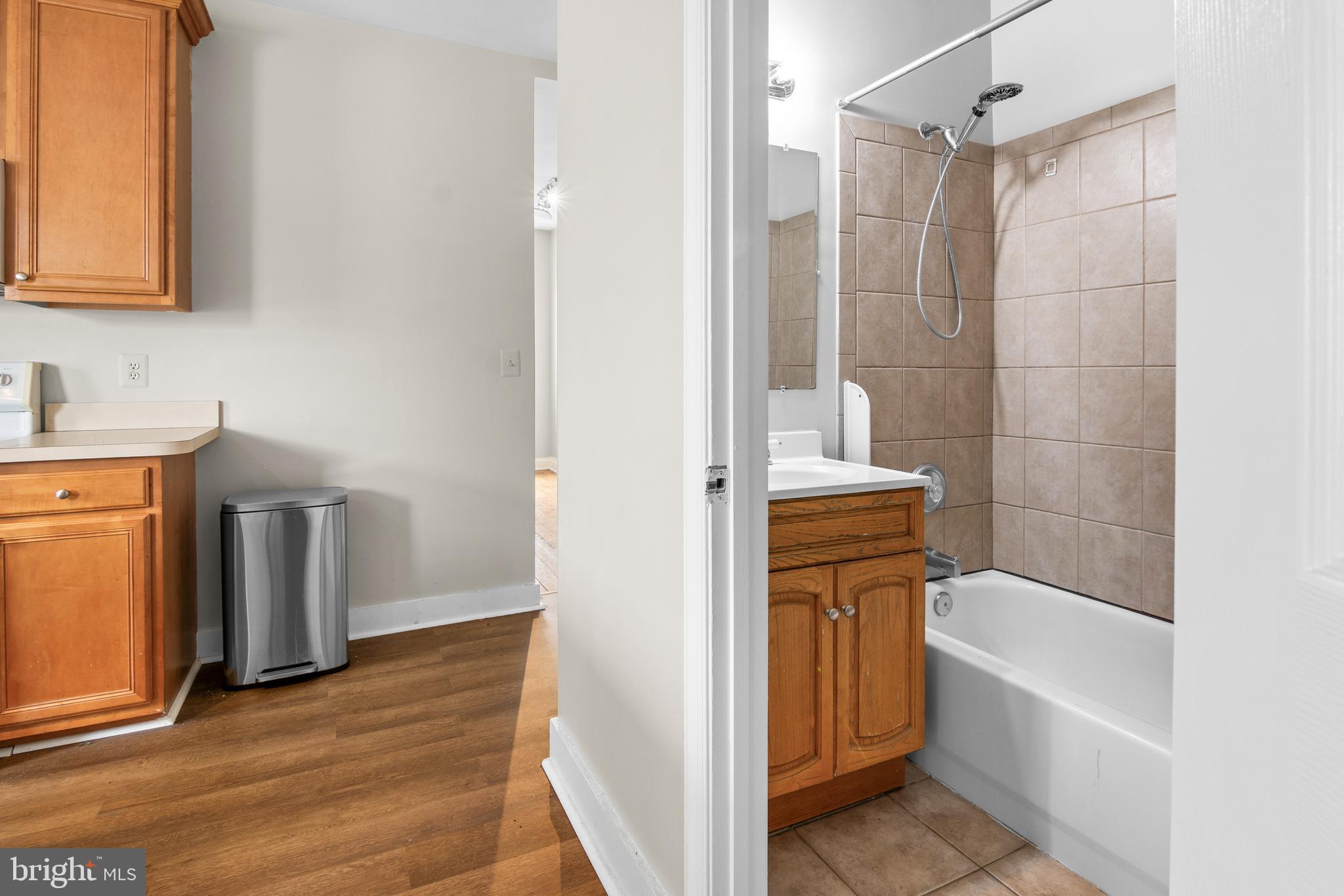 2112 Fleet Street Baltimore, MD 21231 - Photo 54 of 62 a bathroom with a tub sink and toilet