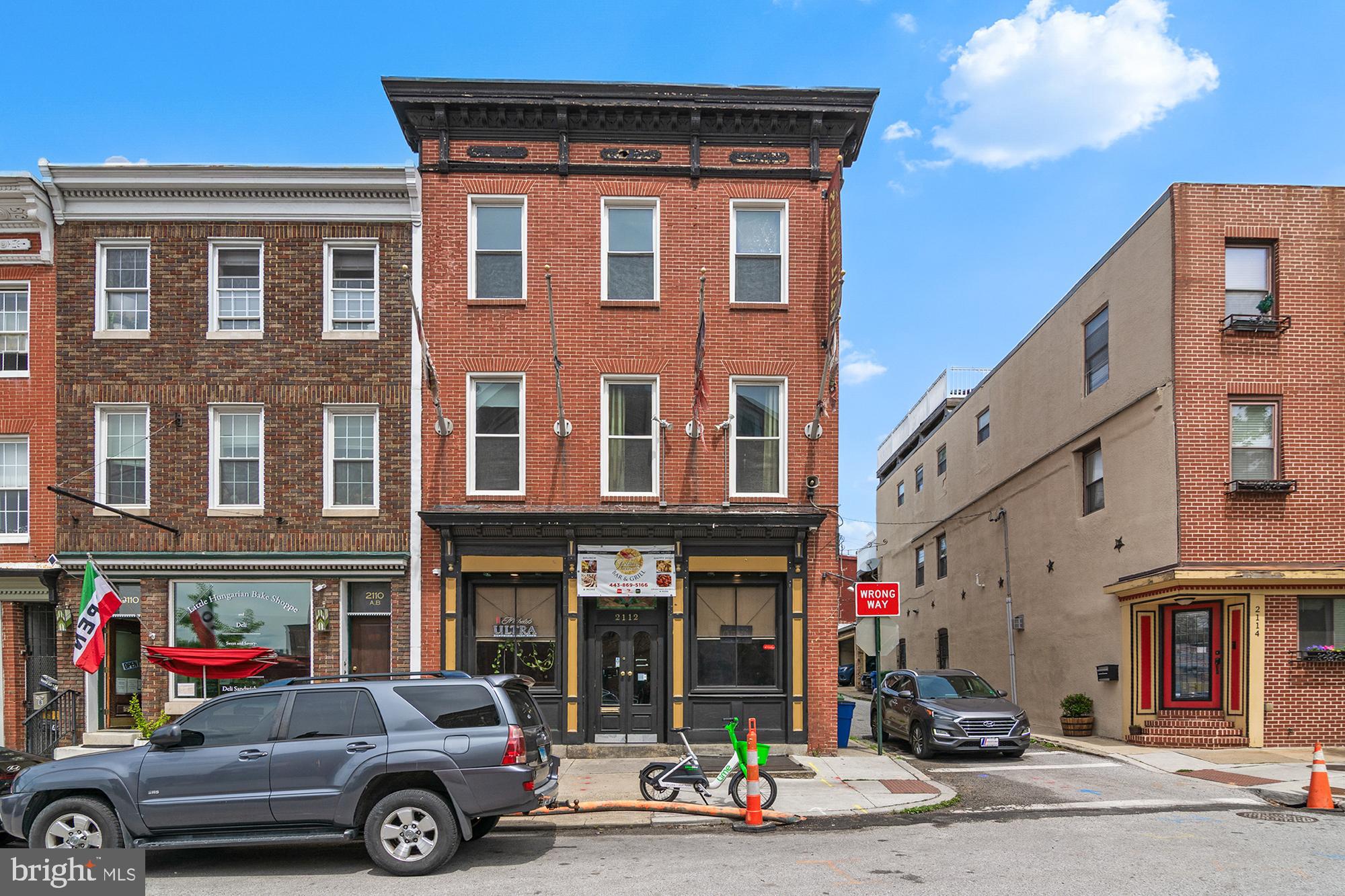 2112 Fleet Street Baltimore, MD 21231 - Photo 62 of 62 a car parked in front of a building