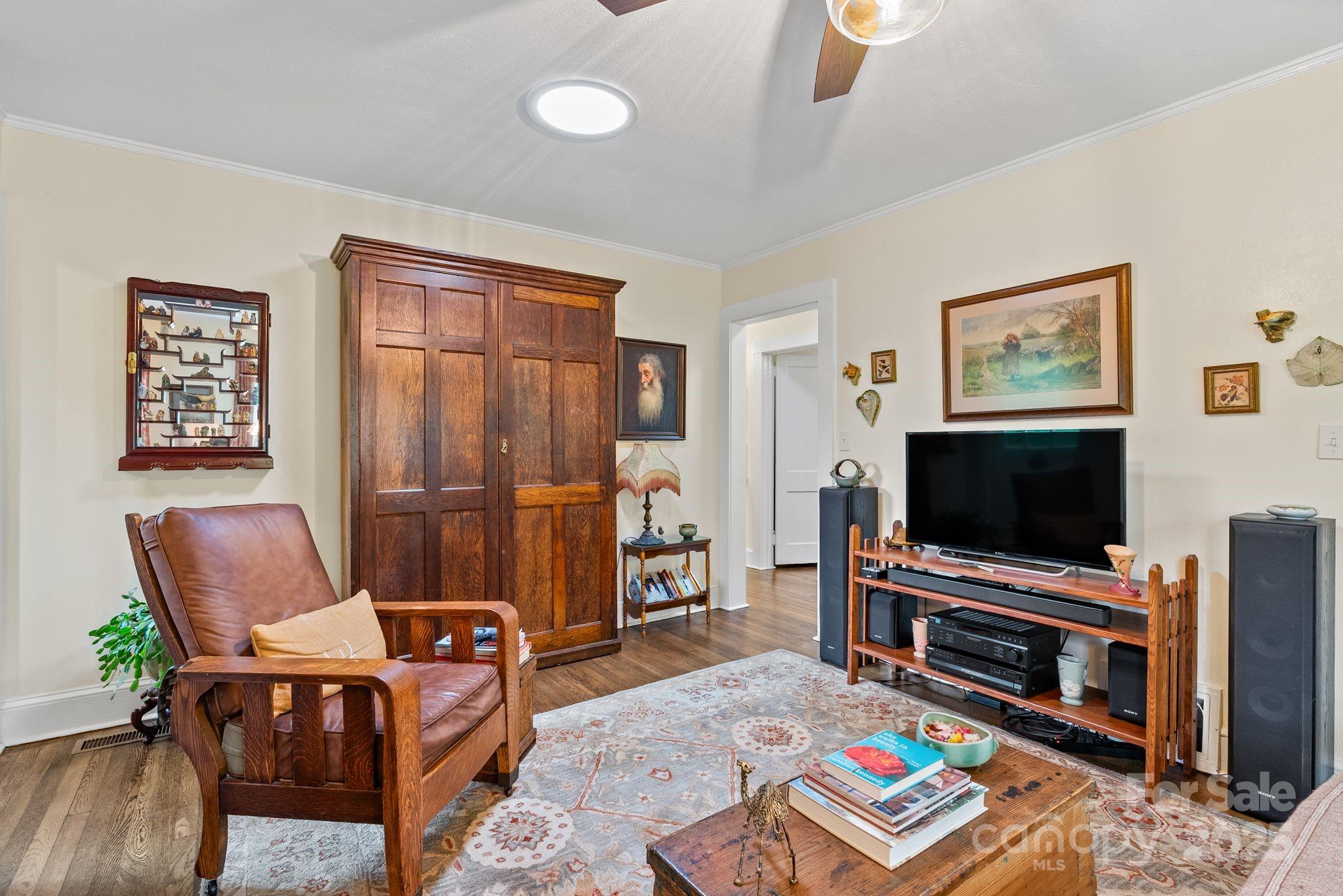160 Hidden Hill Road Tryon, NC 28782 - Photo 13 of 47 a living room with furniture and a flat screen tv