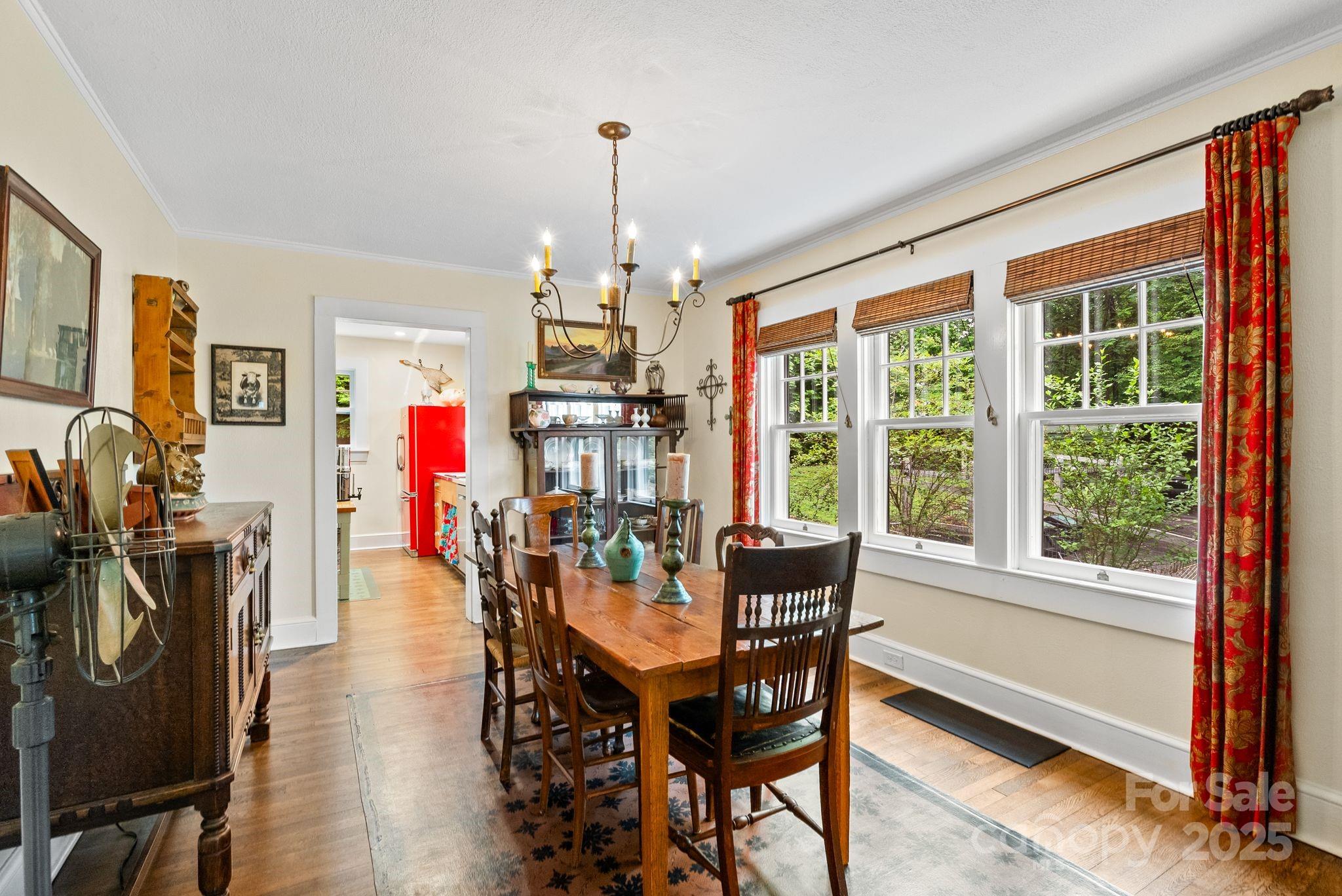 160 Hidden Hill Road Tryon, NC 28782 - Photo 16 of 47 a view of a dining room with furniture window and outside view