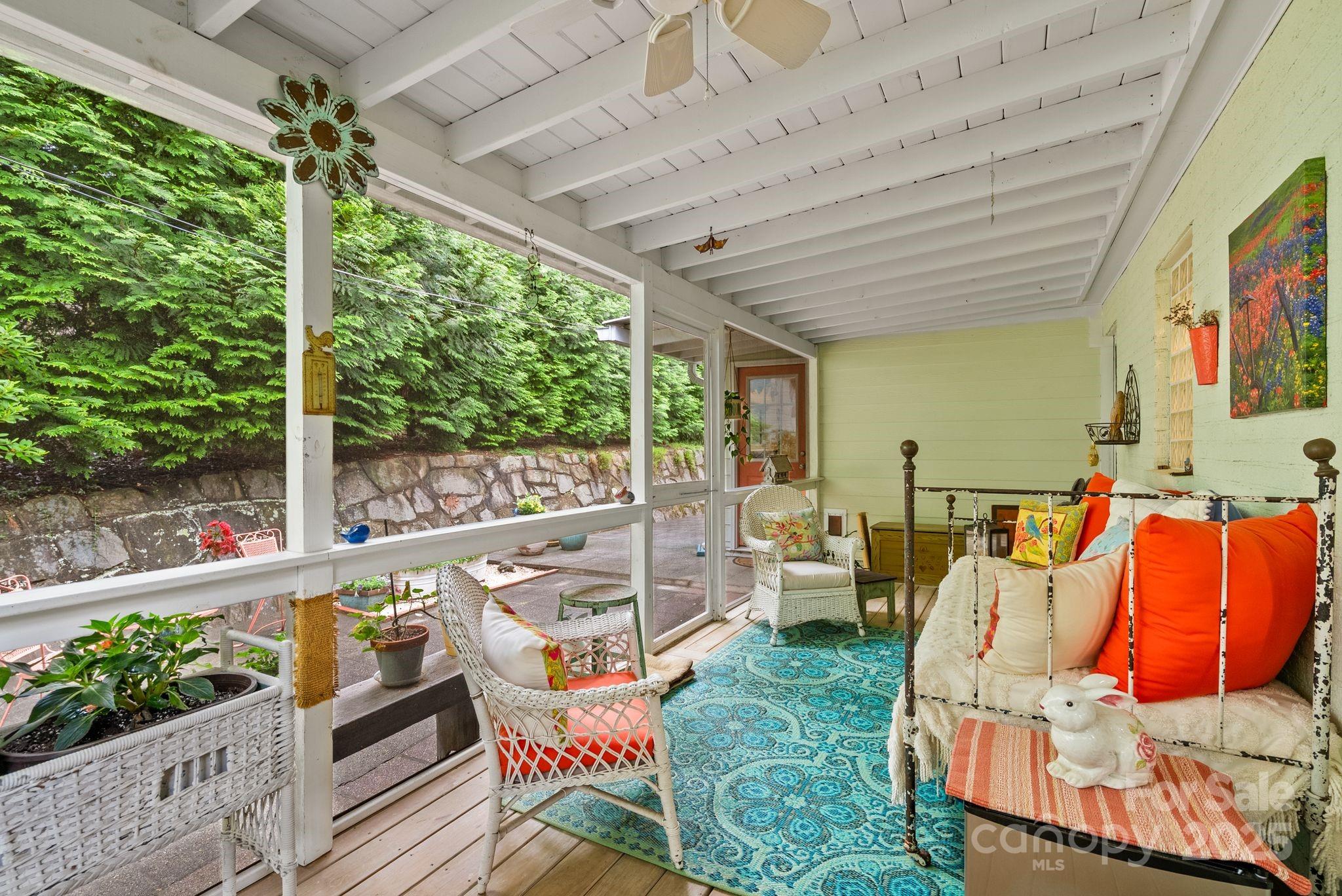 160 Hidden Hill Road Tryon, NC 28782 - Photo 21 of 47 a outdoor space with chairs