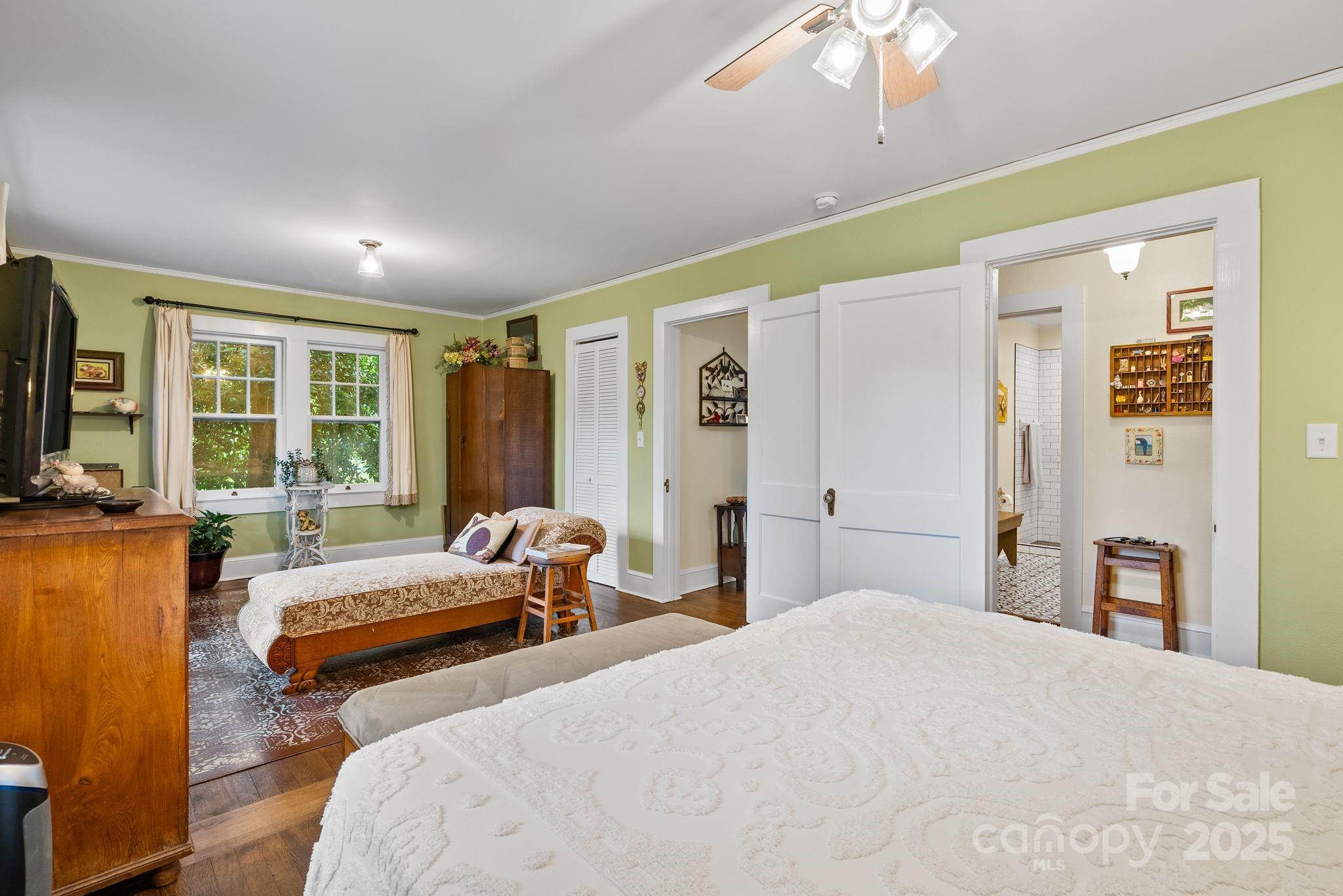 160 Hidden Hill Road Tryon, NC 28782 - Photo 22 of 47 a bedroom with two beds and a large window
