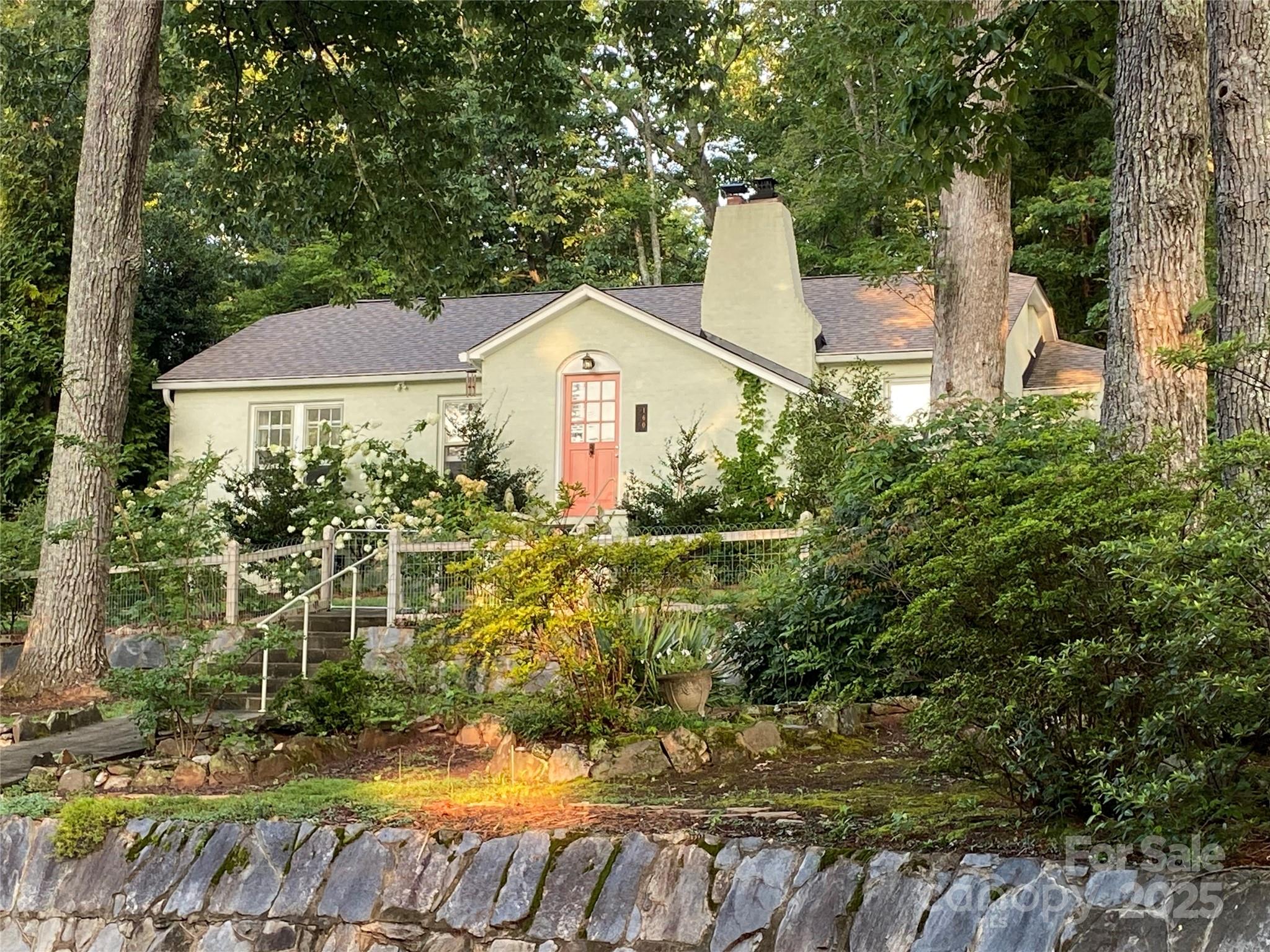 160 Hidden Hill Road Tryon, NC 28782 - Photo 3 of 47 a view of a house with a yard