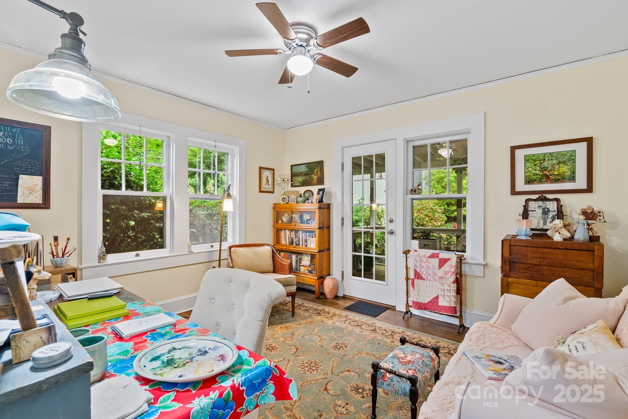 160 Hidden Hill Road Tryon, NC 28782 - Photo 34 of 47 a bedroom with a bed and a couch