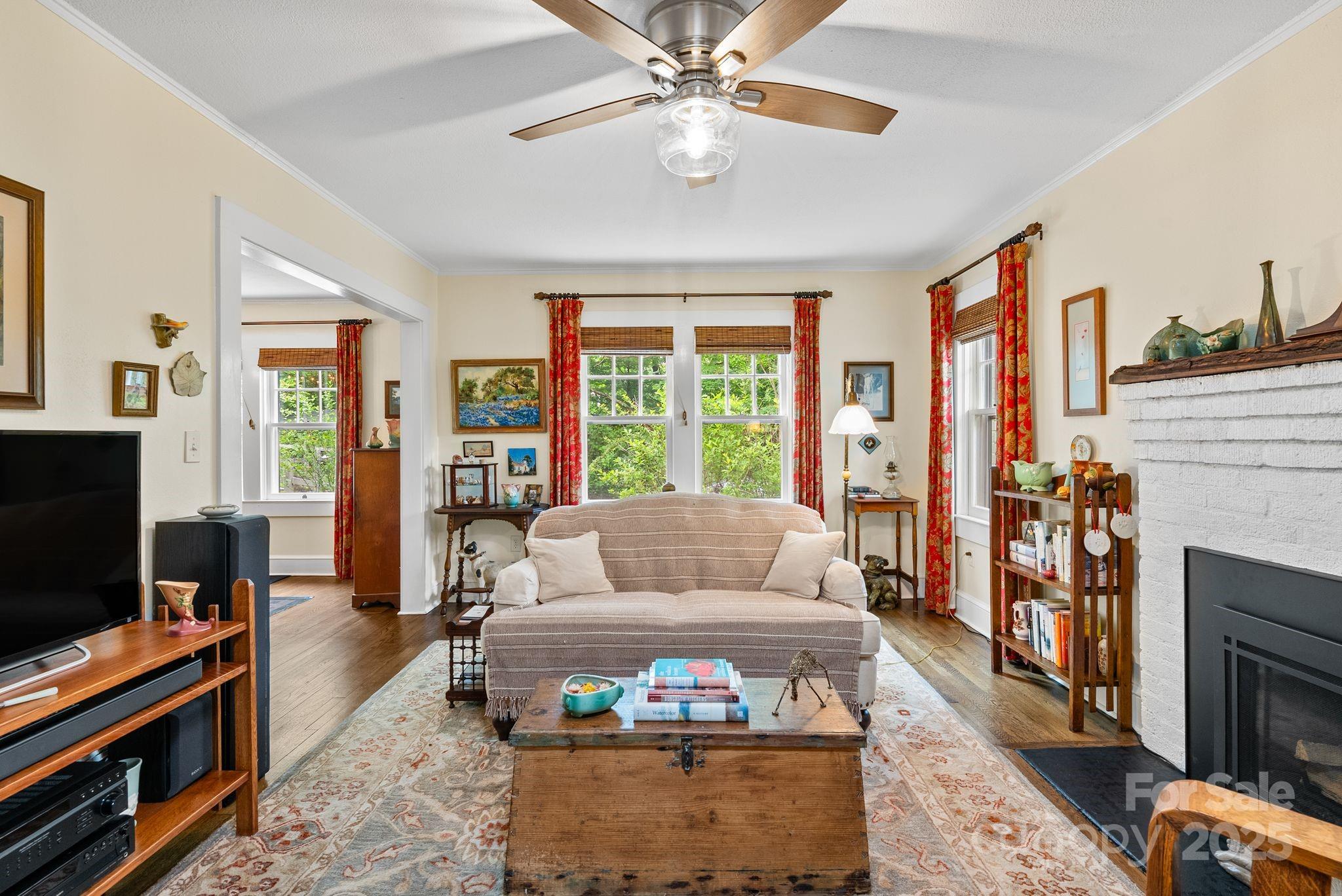 160 Hidden Hill Road Tryon, NC 28782 - Photo 37 of 47 a living room with furniture and a flat screen tv