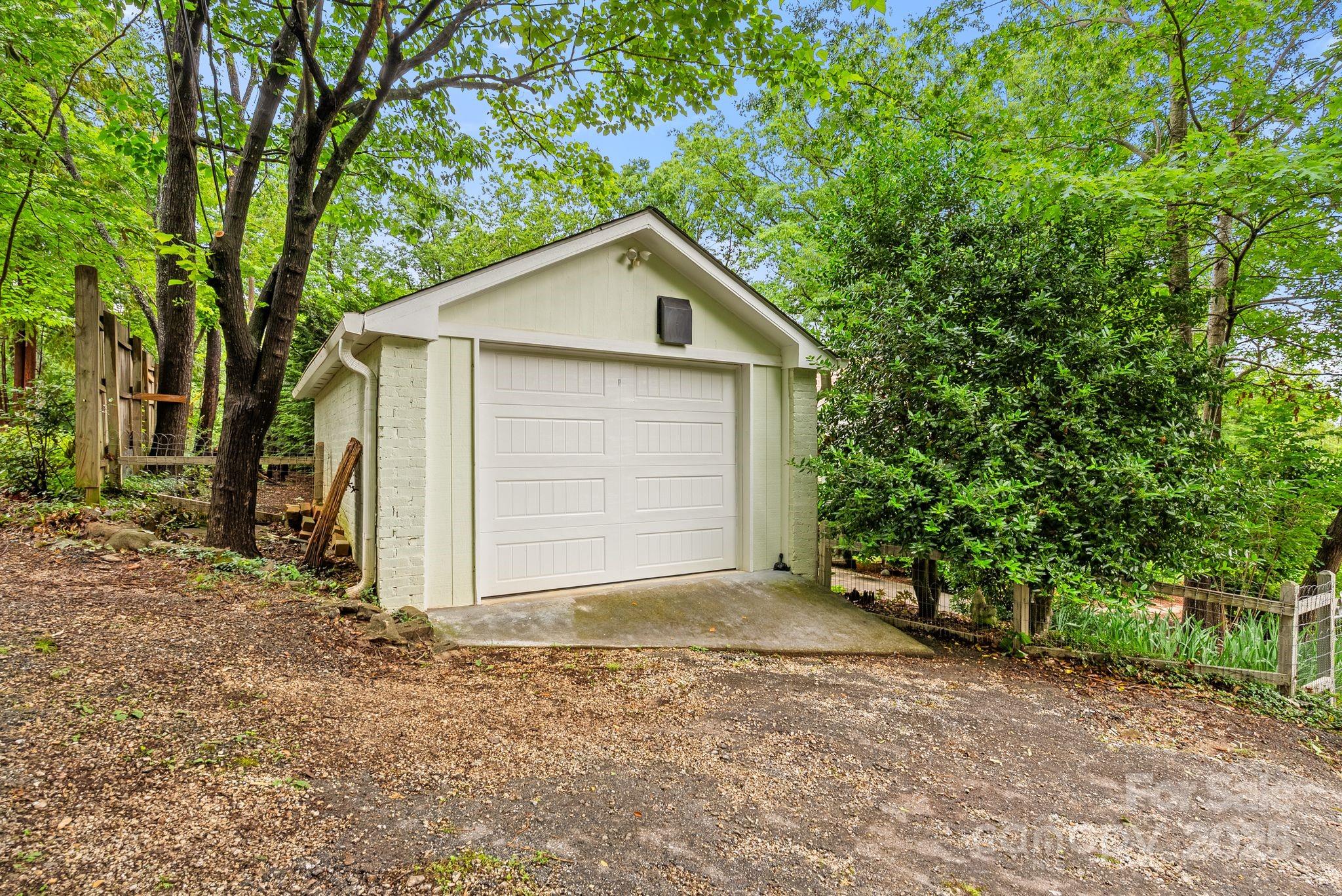 160 Hidden Hill Road Tryon, NC 28782 - Photo 44 of 47 a front view of house with yard