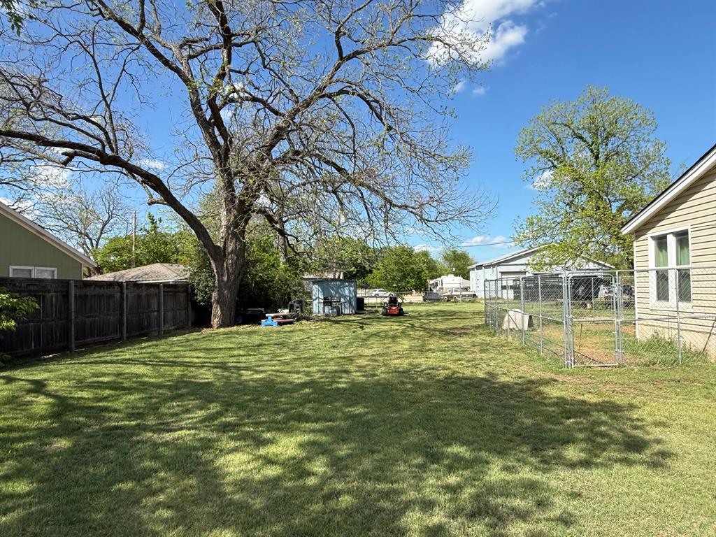 306 3rd Street Valley Mills, TX 76689 - Photo 6 of 14 a view of a house with a big yard