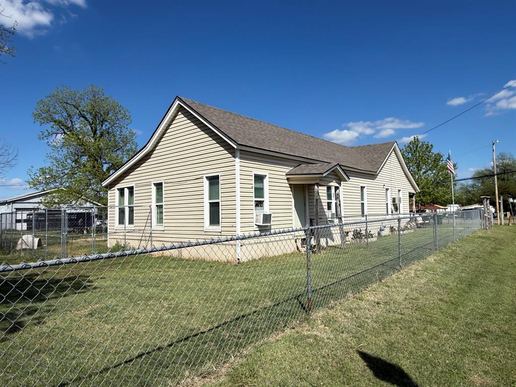 306 3rd Street Valley Mills, TX 76689 - Photo 7 of 14 a front view of a house with a yard