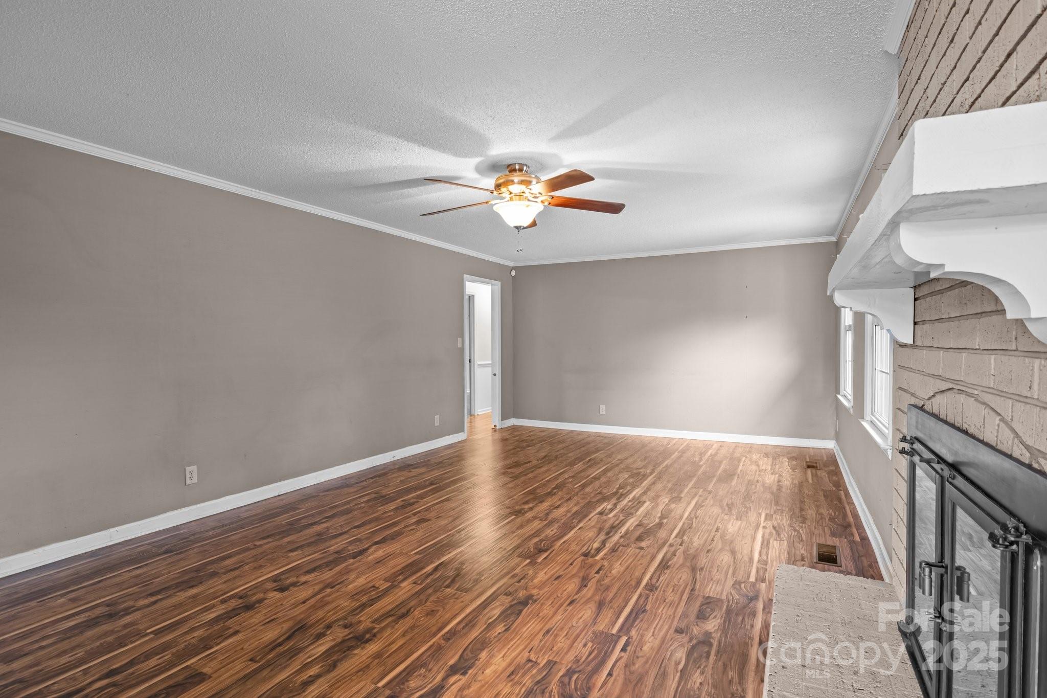 101 Wynnchester Road Gastonia, NC 28056 - Photo 18 of 46 wooden floor in an empty room with a window