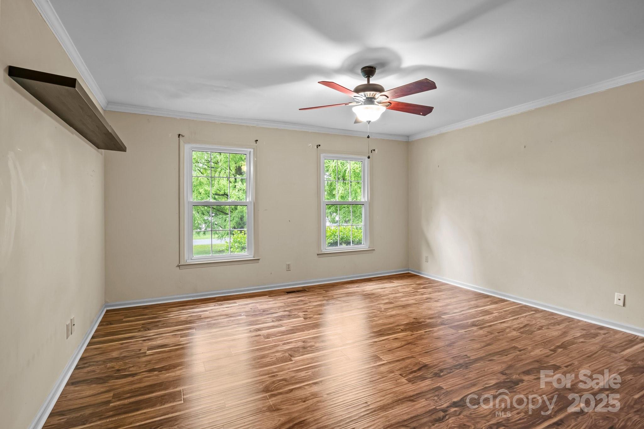 101 Wynnchester Road Gastonia, NC 28056 - Photo 20 of 46 wooden floor in an empty room with a window