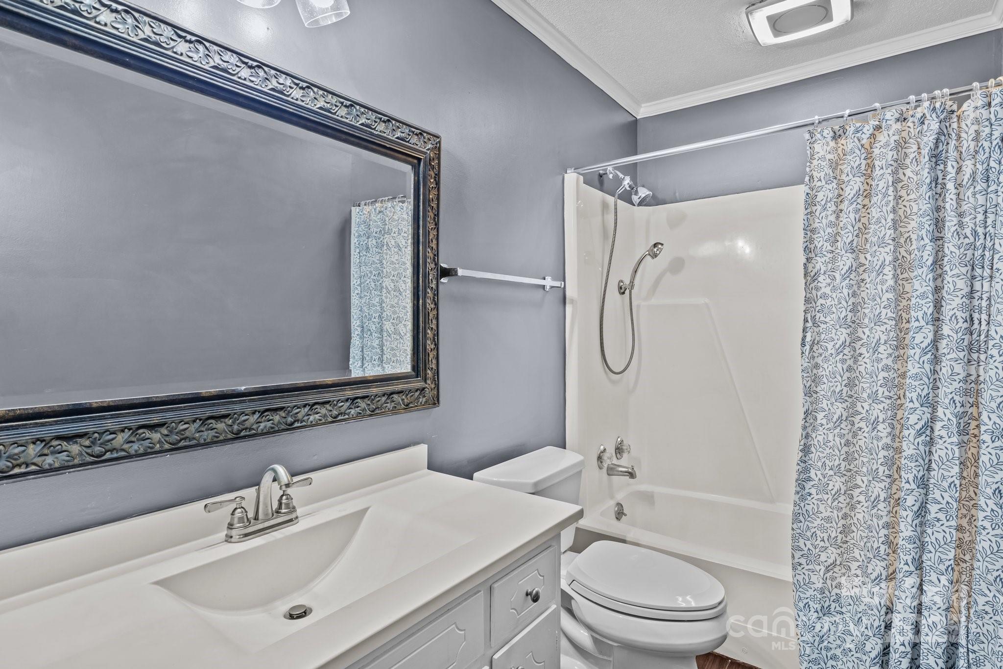 101 Wynnchester Road Gastonia, NC 28056 - Photo 21 of 46 a bathroom with a granite countertop sink toilet and shower