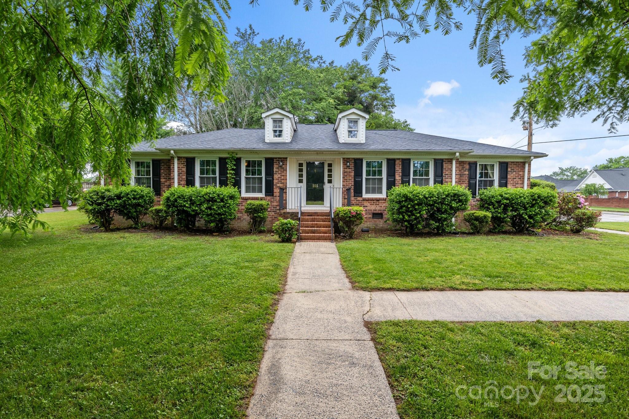 101 Wynnchester Road Gastonia, NC 28056 - Photo 30 of 46 a front view of a house with a yard