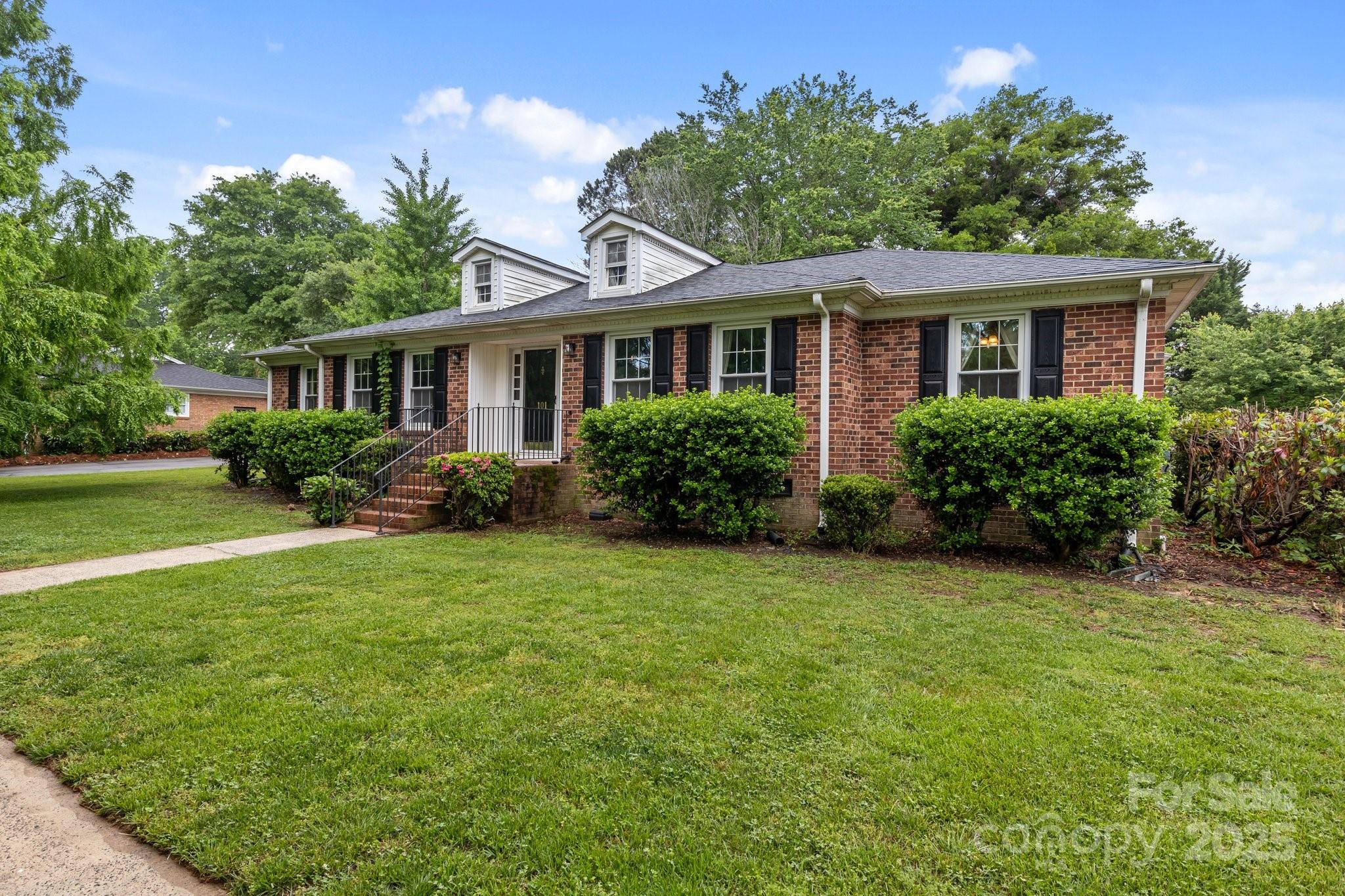 101 Wynnchester Road Gastonia, NC 28056 - Photo 32 of 46 a front view of house with yard and green space