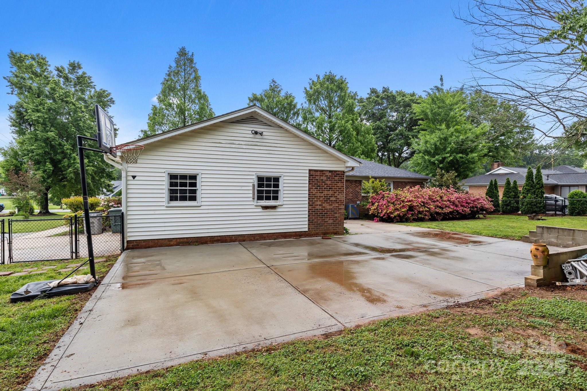 101 Wynnchester Road Gastonia, NC 28056 - Photo 36 of 46 a view of a backyard with a garden and plants