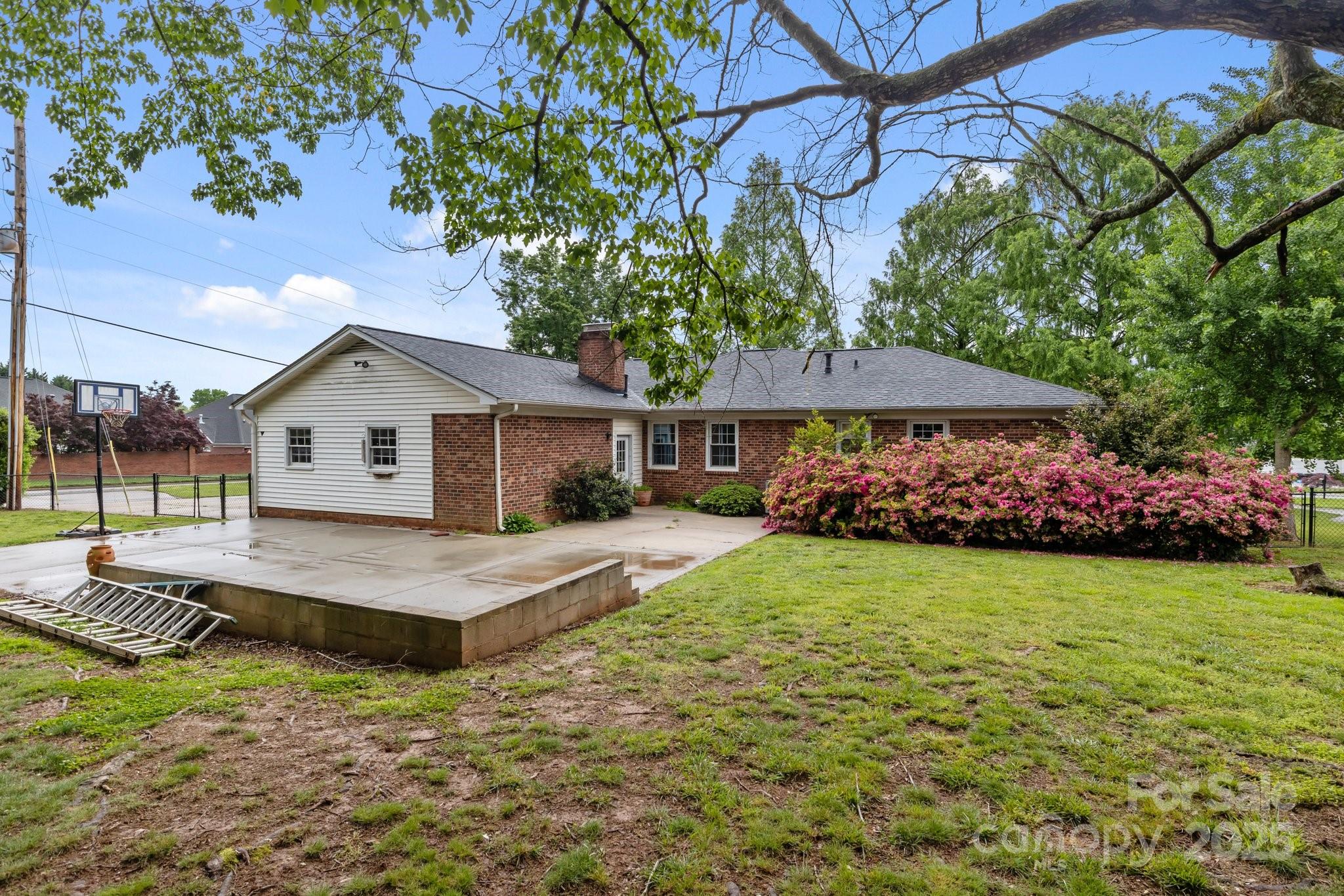 101 Wynnchester Road Gastonia, NC 28056 - Photo 37 of 46 a front view of a house with garden
