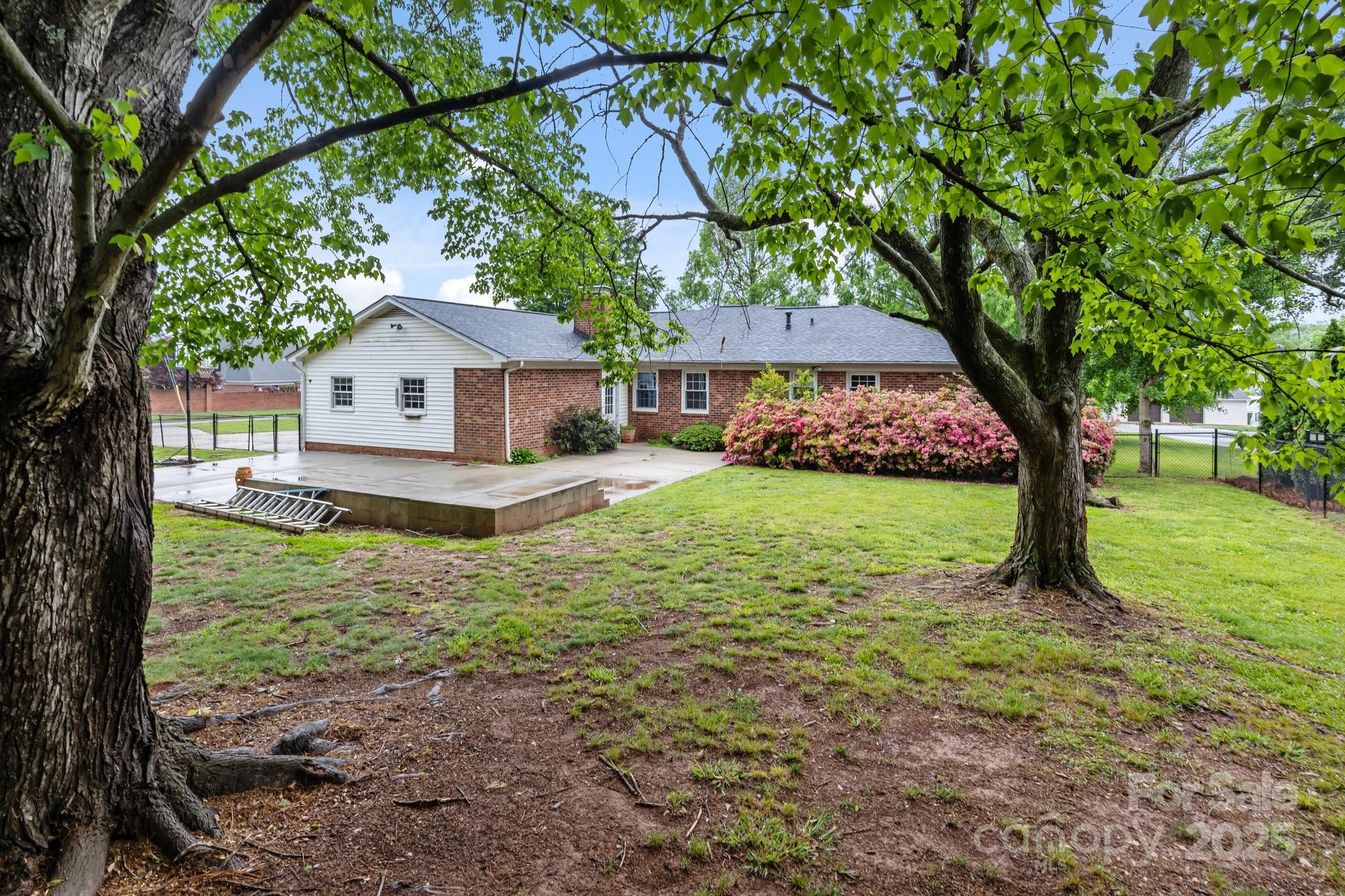 101 Wynnchester Road Gastonia, NC 28056 - Photo 38 of 46 a front view of a house with garden