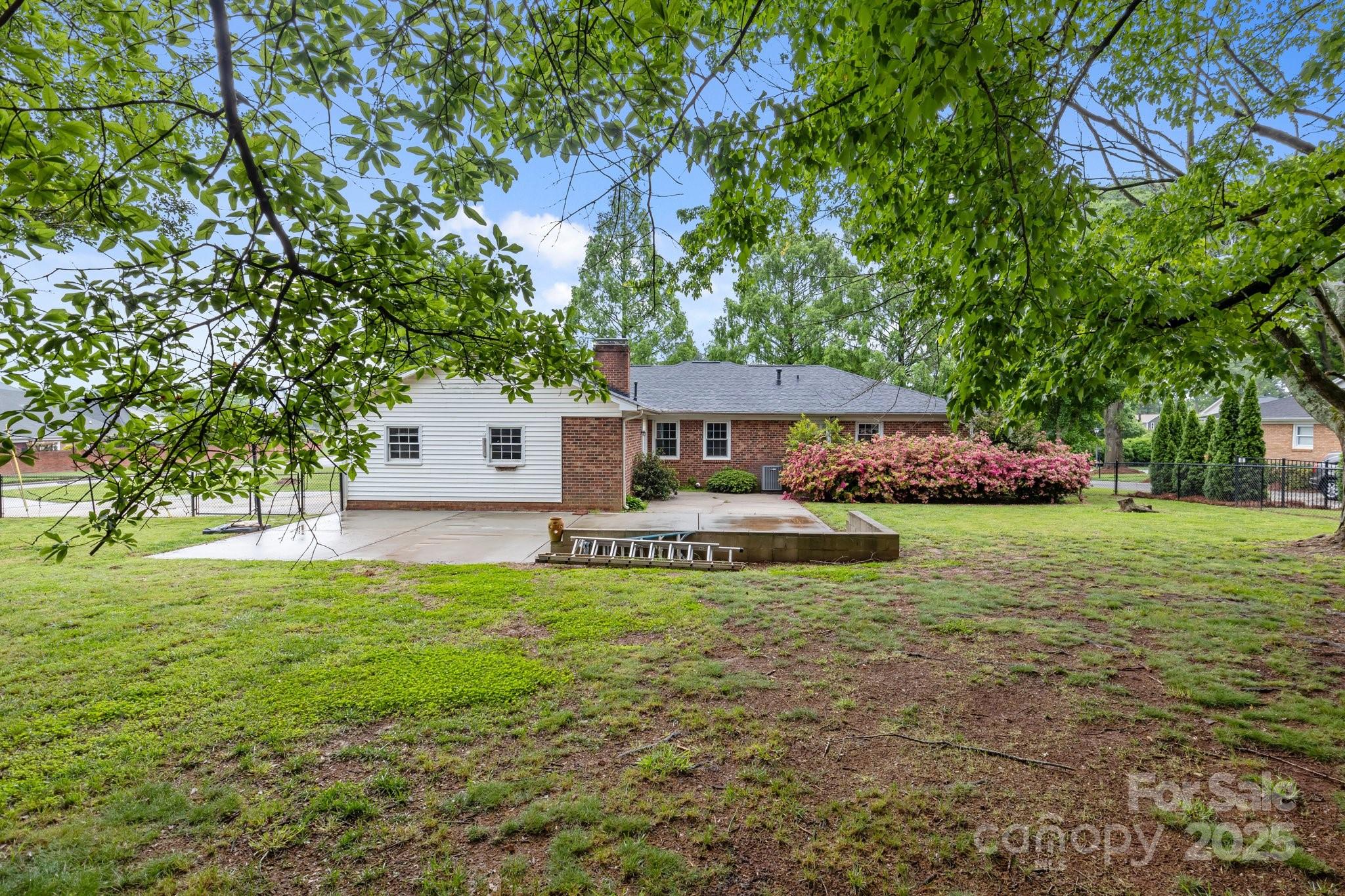 101 Wynnchester Road Gastonia, NC 28056 - Photo 39 of 46 a front view of a house with garden