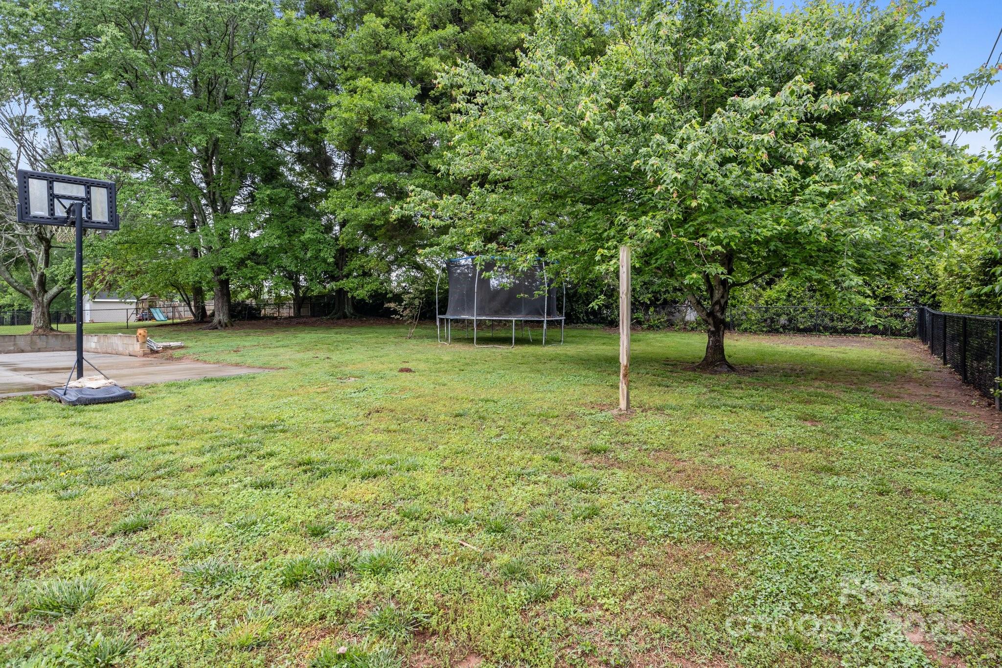 101 Wynnchester Road Gastonia, NC 28056 - Photo 42 of 46 a view of a yard with a tree