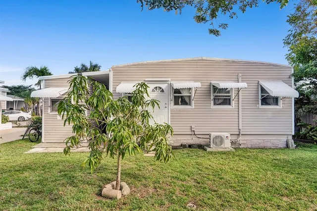 a view of a backyard with plants