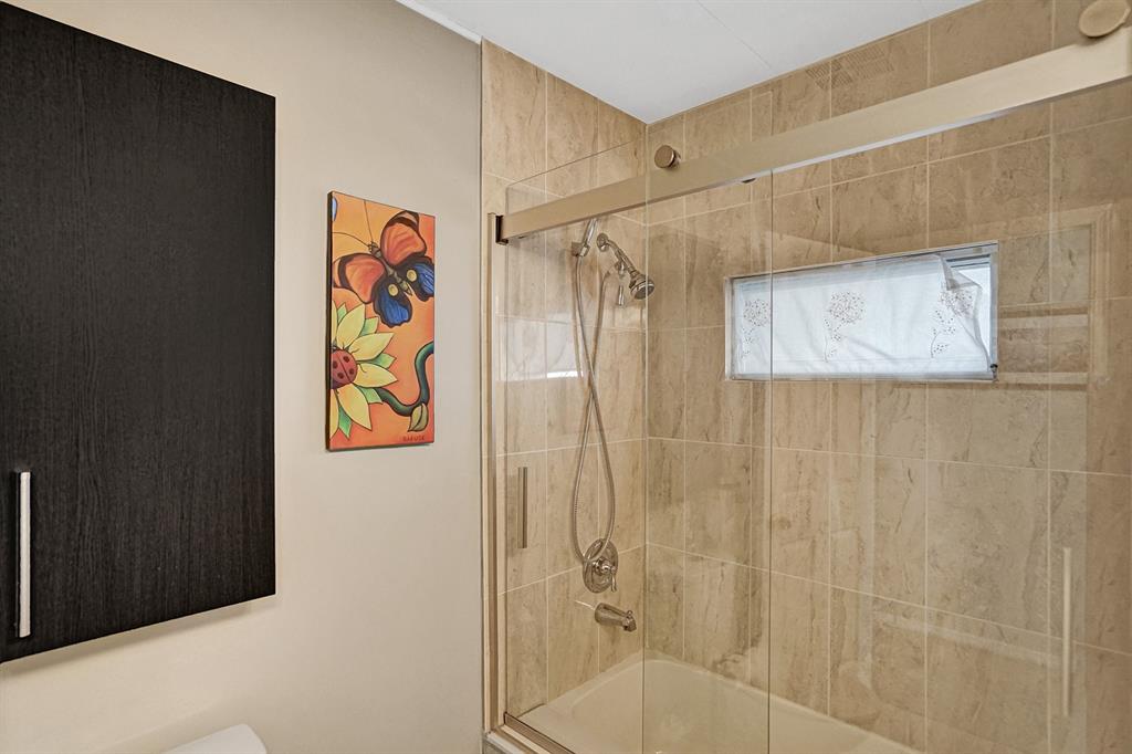 2301 Southwest 86th Terrace Davie, FL 33324 - Photo 28 of 31 a bathroom with a shower and a sink