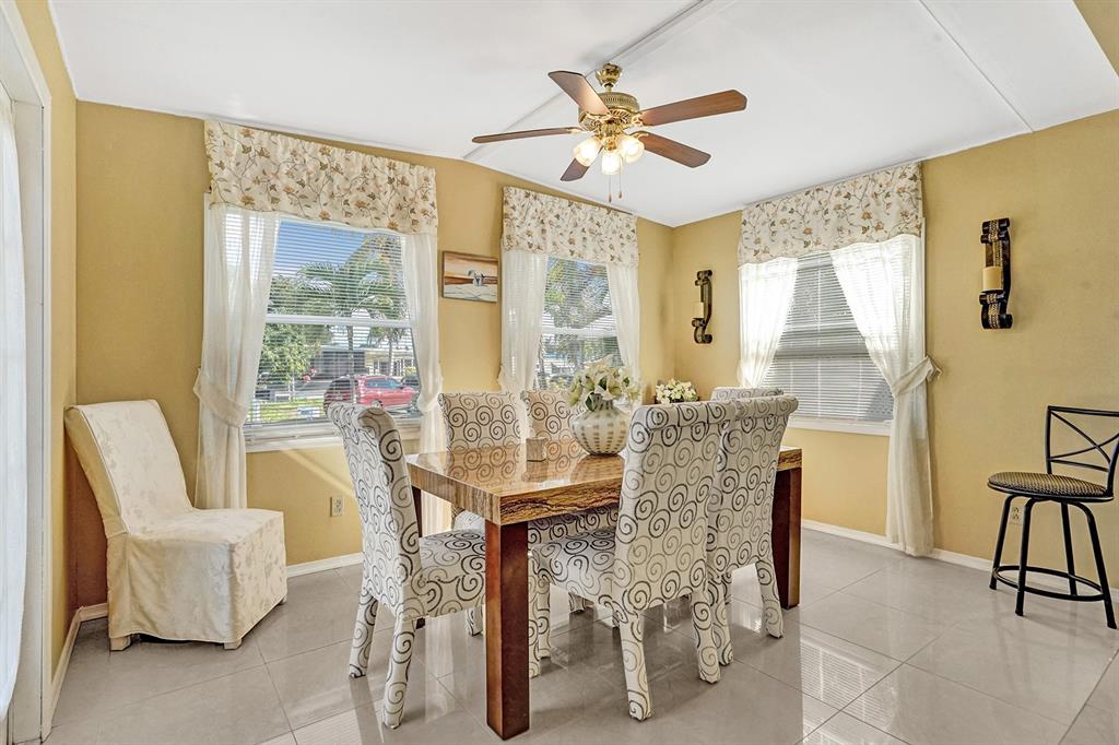 2301 Southwest 86th Terrace Davie, FL 33324 - Photo 4 of 31 a dining room with furniture and window