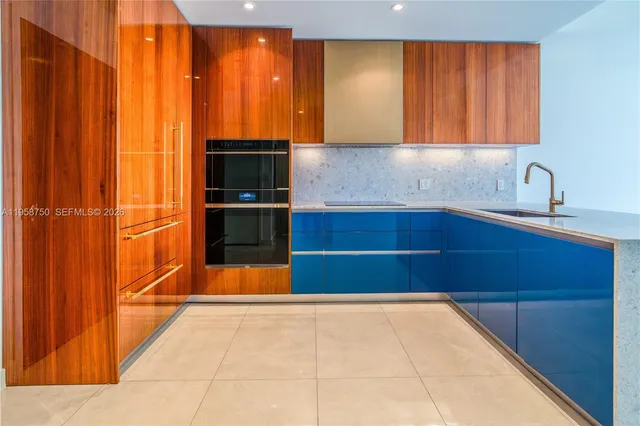 a kitchen with a sink and a window