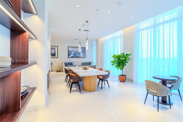 a view of a balcony with flower plants