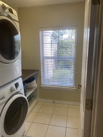 a view of a room with washer and dryer