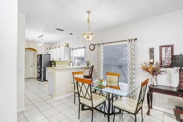 a view of a dining room with furniture
