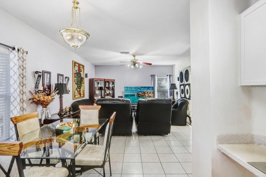 8638 Hawbuck Street Trinity, FL 34655 - Photo 20 of 43 a view of a dining room with furniture