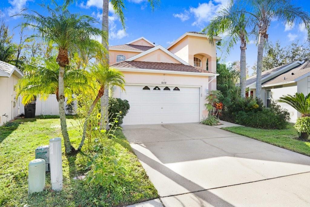 8638 Hawbuck Street Trinity, FL 34655 - Photo 5 of 43 a front view of a house with a yard