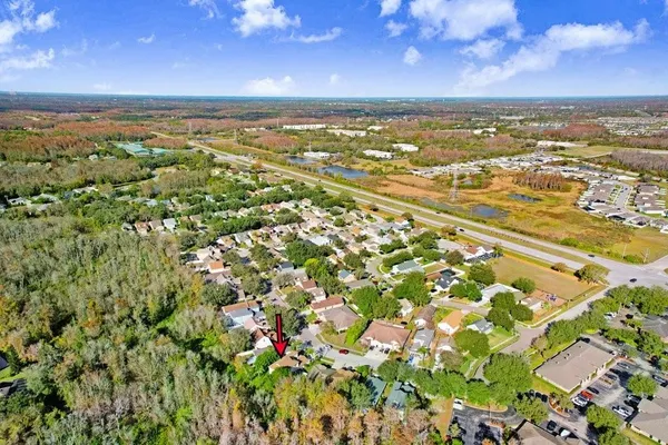 view of a house with a flower garden