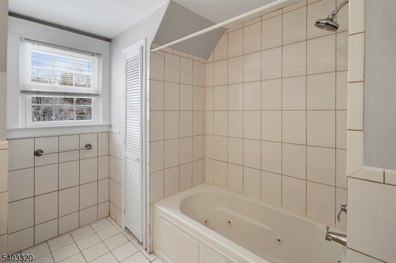 170 New Providence Road Mountainside, NJ 07092 - Photo 37 of 50 a bathroom with a bathtub