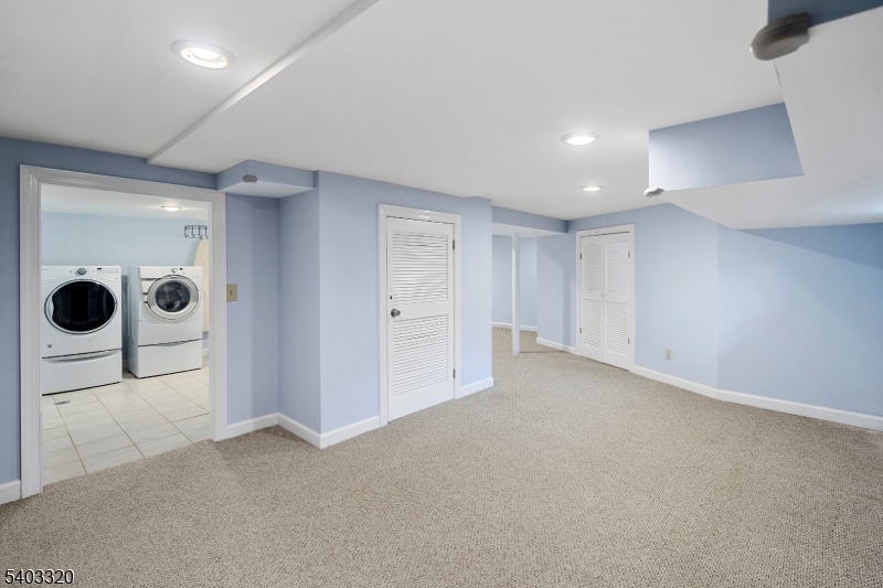 170 New Providence Road Mountainside, NJ 07092 - Photo 40 of 50 an empty room with glass door and shower