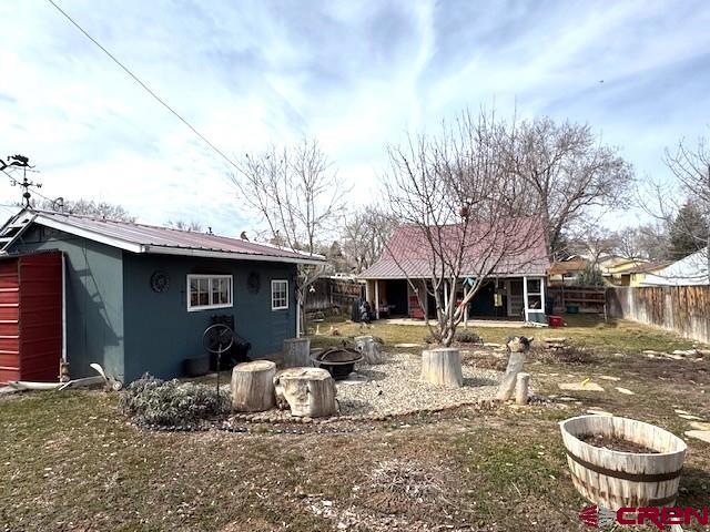 308 North Beech Street Cortez, CO 81321 - Photo 11 of 35 a front view of a house with garden
