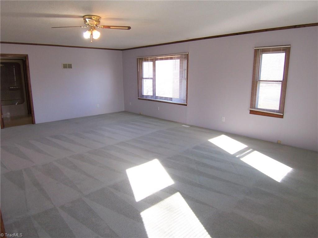 858 Cable Creek Road Asheboro, NC 27205 - Photo 12 of 26 Primary bedroom freshly painted with new carpeting.