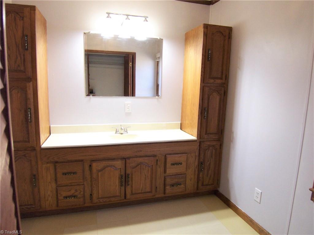 858 Cable Creek Road Asheboro, NC 27205 - Photo 16 of 26 Primary bathroom new light fixtures