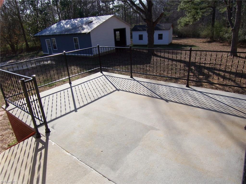 858 Cable Creek Road Asheboro, NC 27205 - Photo 19 of 26 Patio view to back yard and two sheds