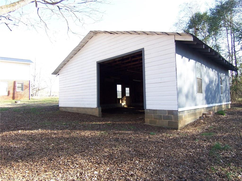 858 Cable Creek Road Asheboro, NC 27205 - Photo 24 of 26 Front view of shed number one. Note that there are 3 mature pecan trees in this area.
