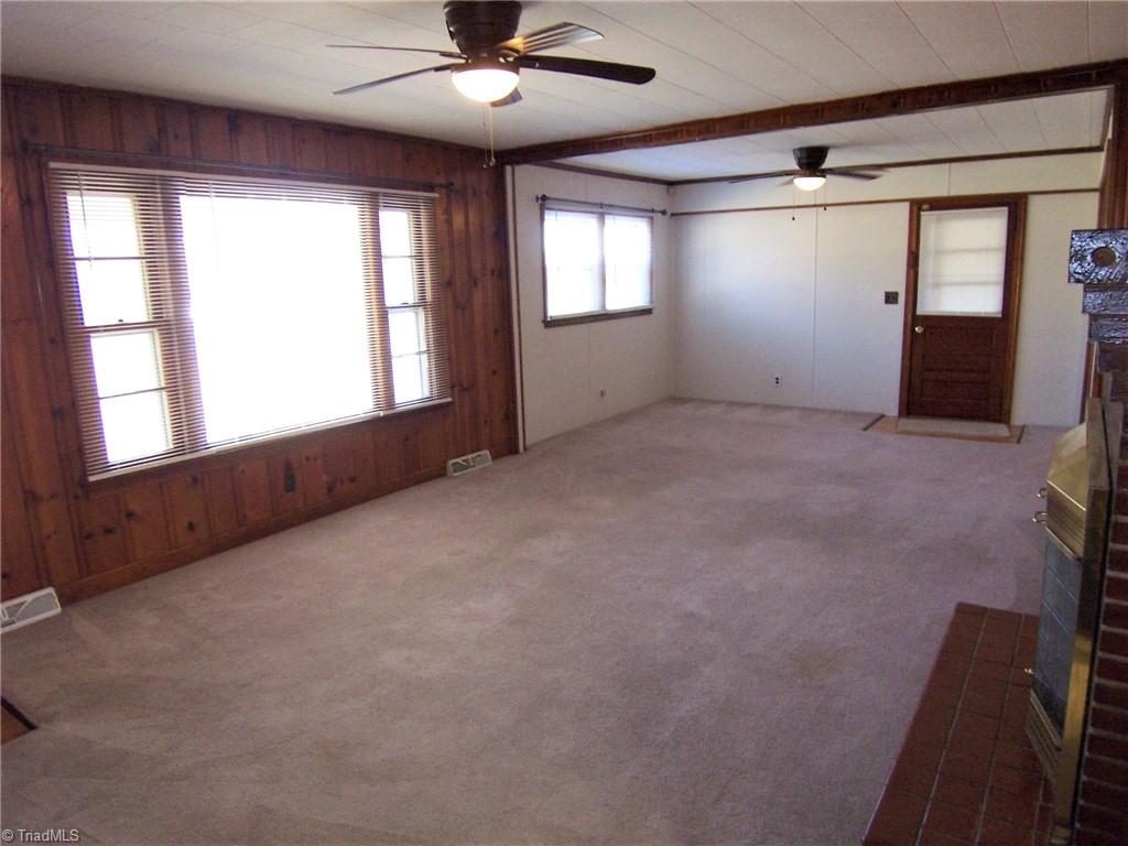 858 Cable Creek Road Asheboro, NC 27205 - Photo 4 of 26 Living room leading to garage.