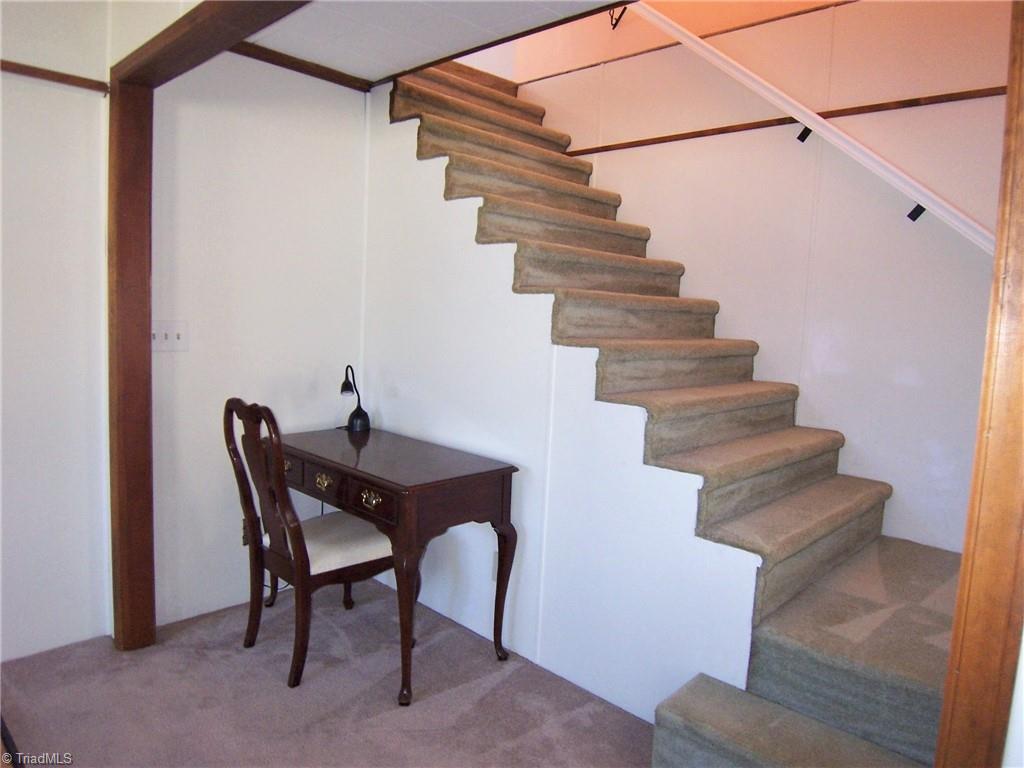 858 Cable Creek Road Asheboro, NC 27205 - Photo 7 of 26 Stairwell leading to primary bedroom